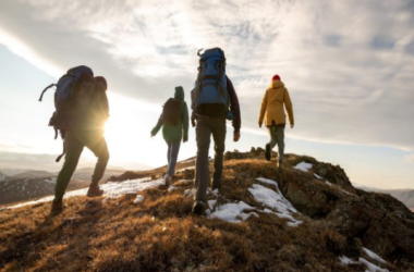 four people climbing