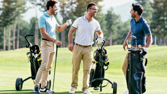 three men playing golf