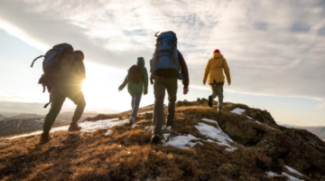 four people climbing