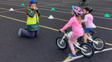 2 children on bicycles